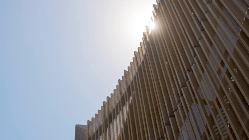 The zinc used in this perforated metal facade is 90 per cent recycled.